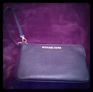 Michael Kors clutch style handbag